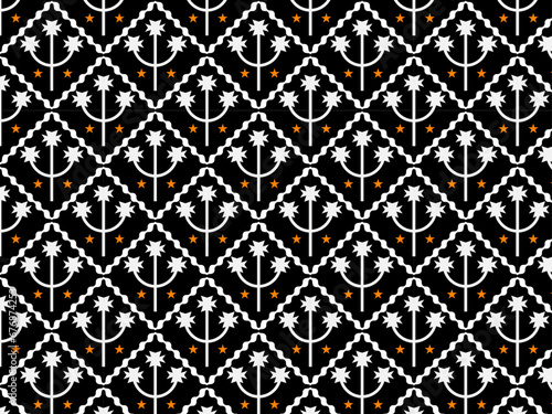Abstract Black and white patchwork pattern with decorative flowers.