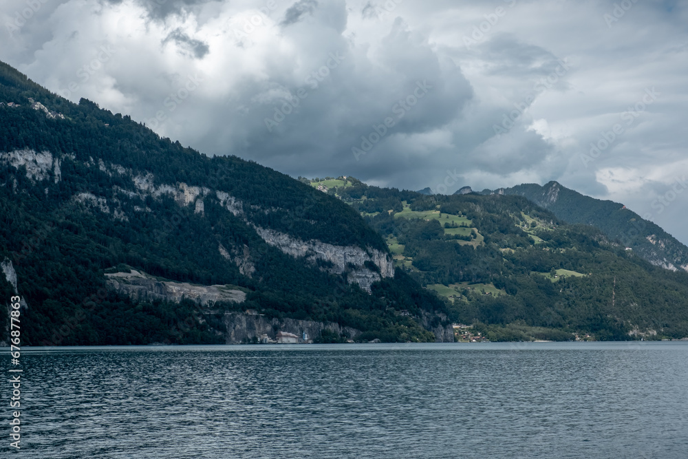 Landscape around the lake Thun on a cloudy day