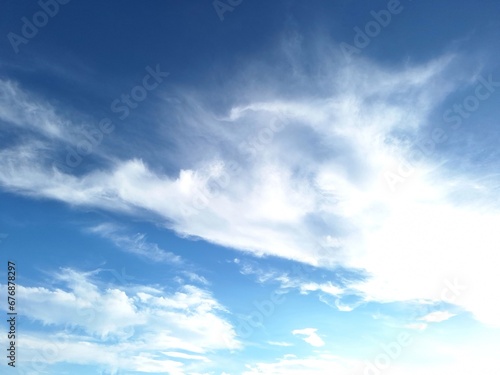 Beautiful blue sky with white clouds for background © Trin