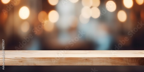  Empty rustic wood table and blurred soft light table in restaurant with bokeh background. product display template.Business presentation.