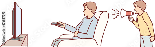 Obraz na płótnie Irresponsible father watches tv, ignoring son screaming into megaphone and wanti