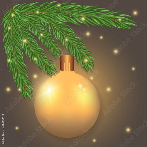Yellow Golden Christmas ball hanging on a fir branch