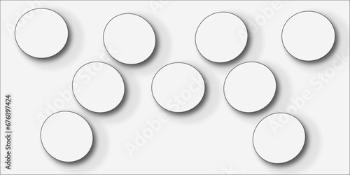 Abstract geometric texture of white paper circles in shining light with soft shadows as mess pattern, border, copy space, top view. White background texture pattern or wallpaper abstract background.