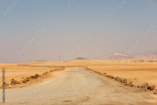 Driveway in Ras Mohamed National Park. Ras Muhammad in Egypt at the southern extreme of the Sinai Peninsula. The road in desert.