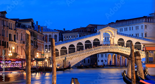 Rialto Bridge illuminated at dusk in Venice, Italy © vlad_g
