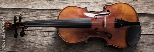 classical violin on wooden table © Daniel