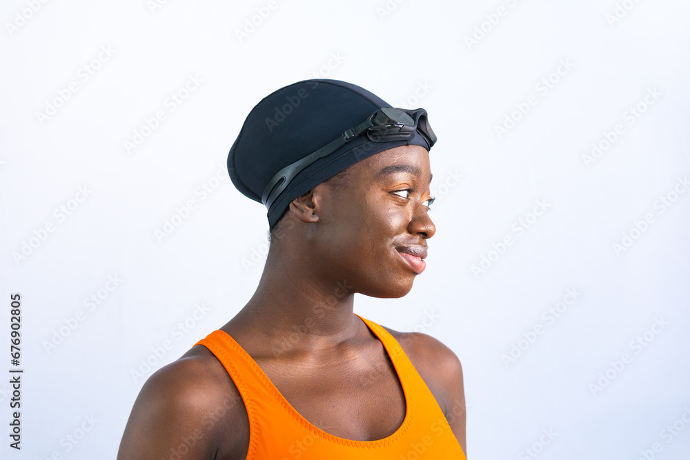 Portrait of a black young woman in swimsuit with plain white background Portrait of a black young woman in swimsuit with plain white background