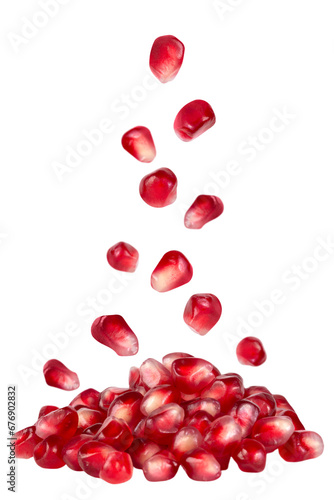 Levitation of pomegranate seeds isolated on transparent background. photo