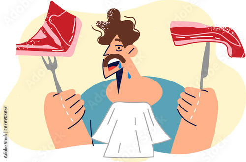 Hungry man holds two steaks and fork with knife, looking forward to eating grilled pork or beef