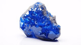 A blue Turkvenit gemstone, a semiprecious mineral, sits on a white backdrop, symbolizing the science of geology.