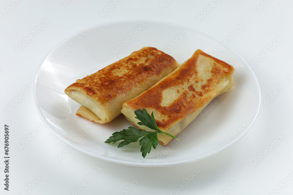 Pancakes dish on a light background
