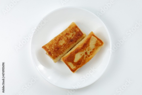 Pancakes dish on a light background