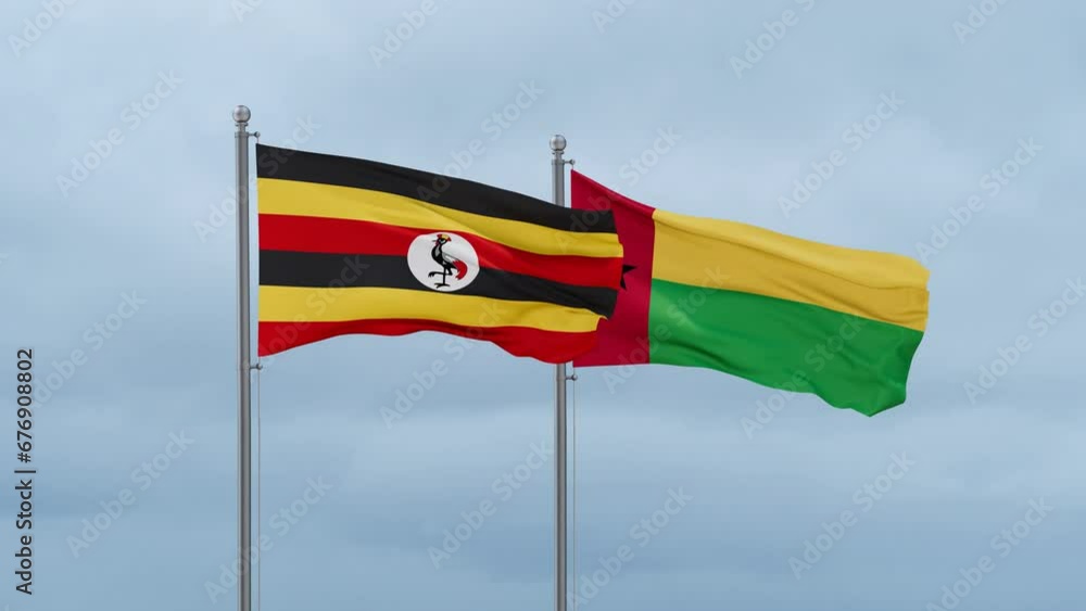 Guinea-Bissau flag and Uganda flag waving together on cloudy sky, endless seamless loop, two country relations concept Guinea-Bissau flag and Uganda flag waving together on cloudy sky, endless seamless loop, two country relations concept