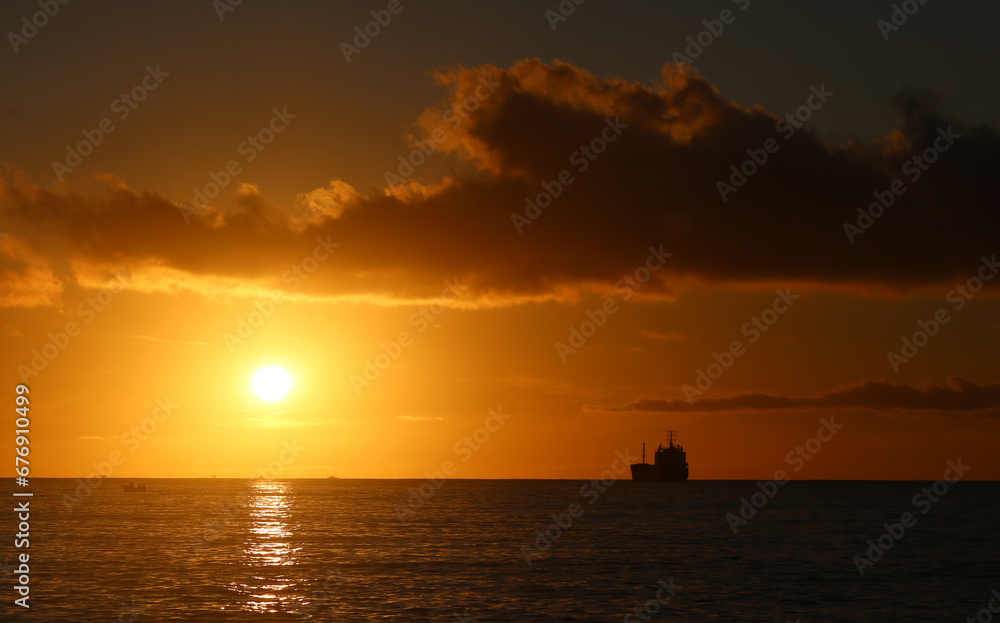 Photos of an amazing sunset at sea with ships