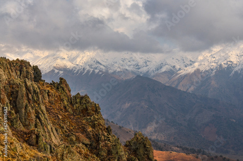 snow covered peaks of Chatkal ridge scenic view from Amirsoy mountain (Tashkent region, Uzbekistan)