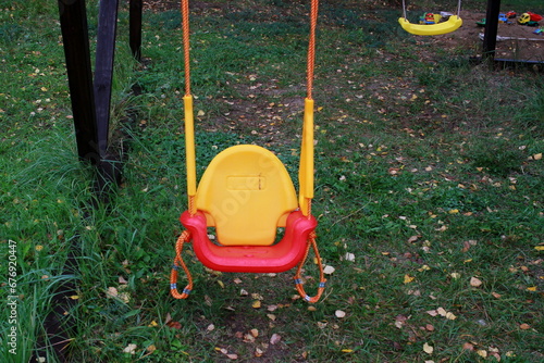 baby plastic swing for toddlers Walking with children.