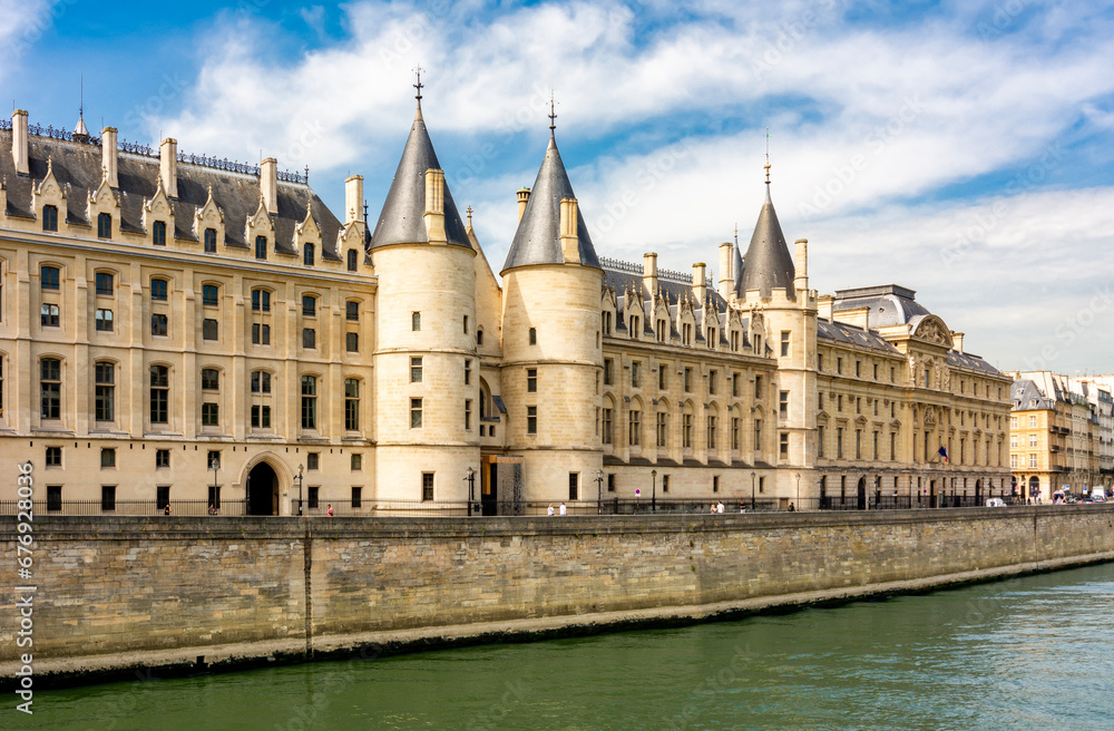 Conciergerie palace along Seine river in Paris, France