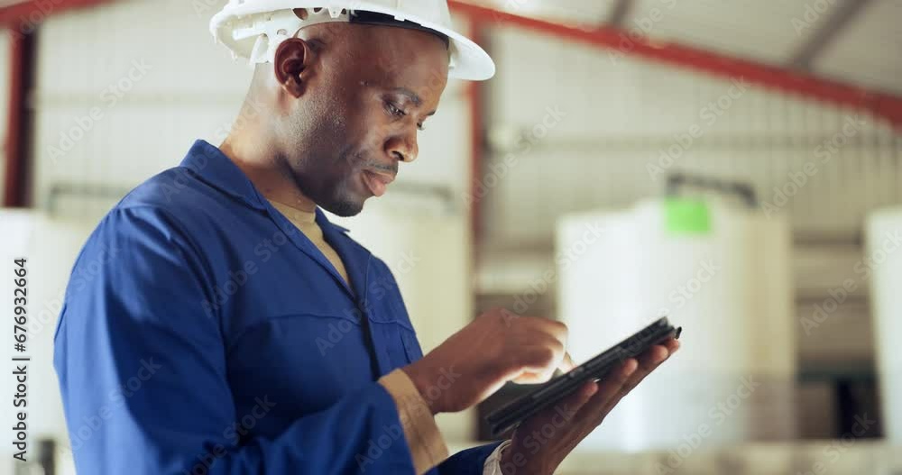 Black man, tablet and engineer at warehouse for maintenance, inspection or research on site. African male person, contractor or technician working on technology in online search or monitoring factory