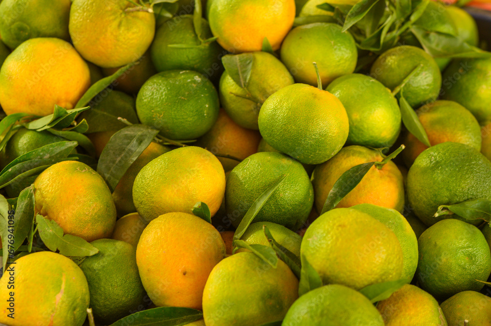 fresh appetizing tangerines at the bazaar on the island of Cyprus in autumn 1