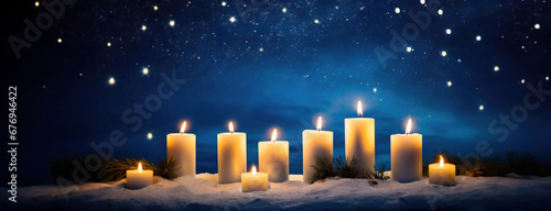 Jewish holiday Hanukkah with nine candles menorah on dark blue stary night sky lights background.