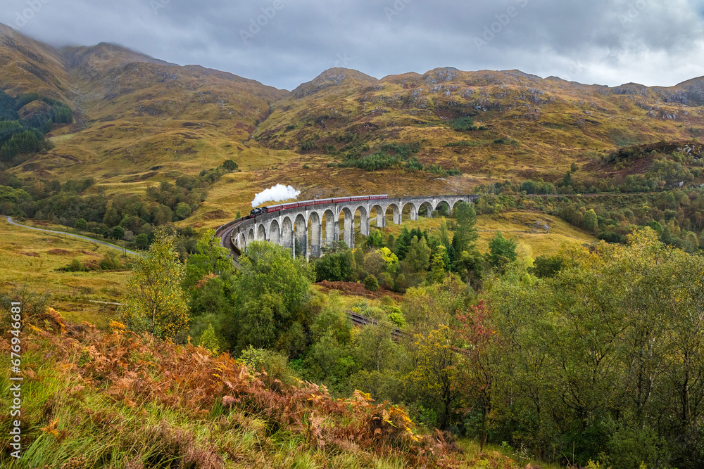 Steam train at the viaduct of Glenfinnan, also known as the Harry Potter train and Harry Potter viaduct. Steam train at the viaduct of Glenfinnan, also known as the Harry Potter train and Harry Potter viaduct.