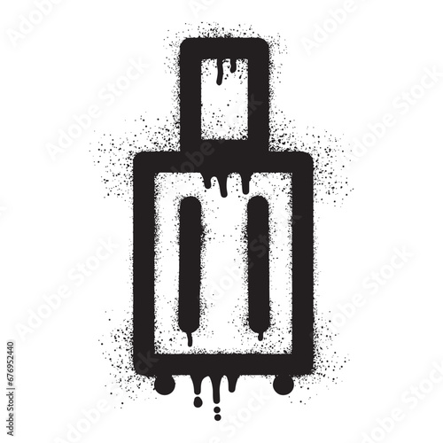 Suitcase graffiti with black spray paint	