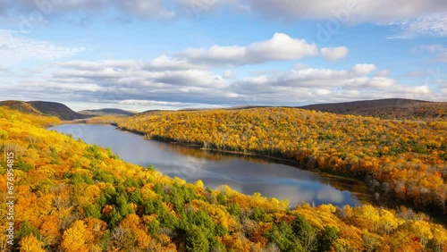 Wallpaper Mural Time lapse of the clouds moving about the beautiful fall colors surrounding a lake in Michigan Torontodigital.ca
