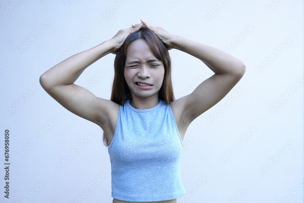 Asian woman has a headache Stressed from work Asian woman has a headache Stressed from work
