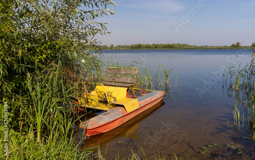 one old catamaran for walking on the lake in the summer season