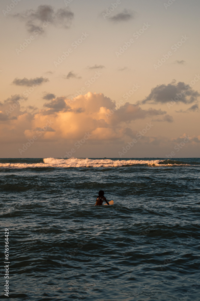 Fototapeta premium surfer at sunset