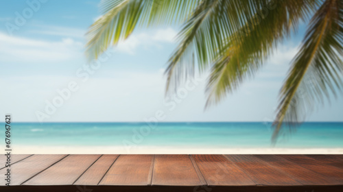 Empty table, sea and palm trees in blurred background © Kondor83