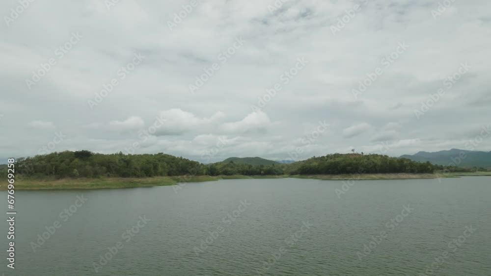Small islands located in the one of the biggest fresh water reservoirs in Thailand name Srinagarind Dam, Kanchanaburi province
