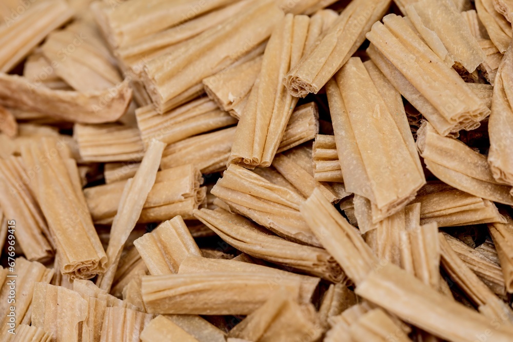 Closeup view of dry tofu skin for background use Closeup view of dry tofu skin for background use