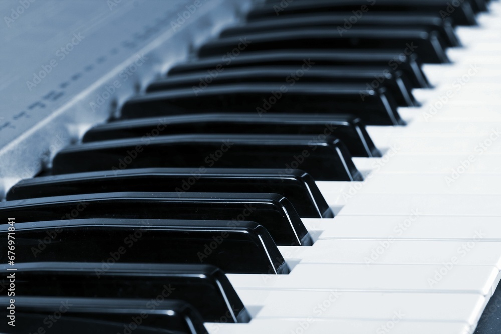 Closeup shot of the electric piano keyboard on the blurred background Closeup shot of the electric piano keyboard on the blurred background