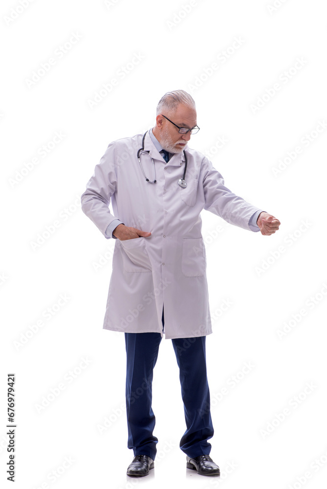 Old male doctor isolated on white Old male doctor isolated on white