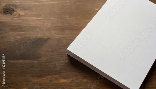 Obraz na płótnie Cahier Blanc sur Fond en Bois w salonie
