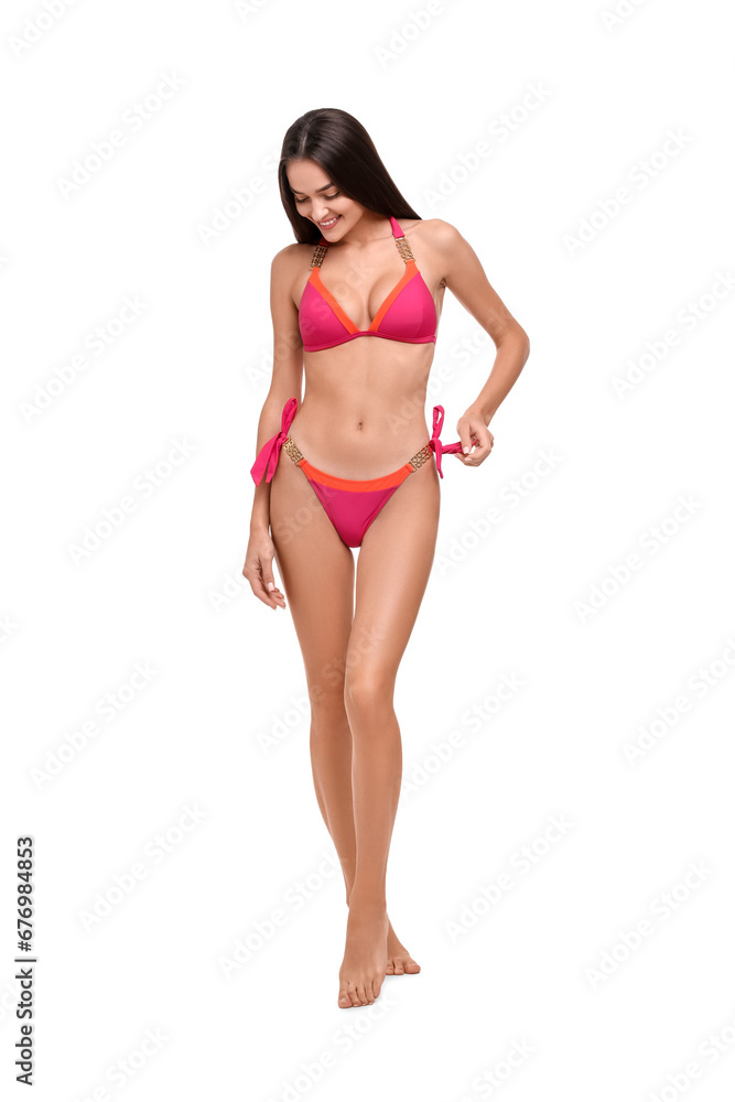 Fototapeta premium Young woman in stylish bikini isolated on white