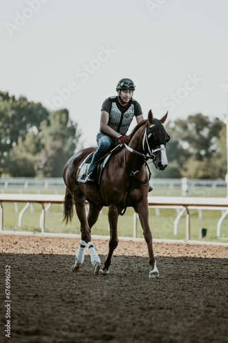 Thoroughbred race horse and rider