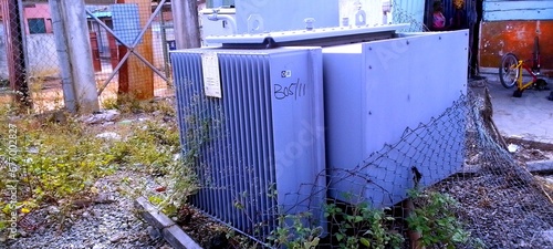 High voltage transformer supplying power to homes. photo