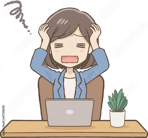 パソコン前で頭を抱えるスーツ女性