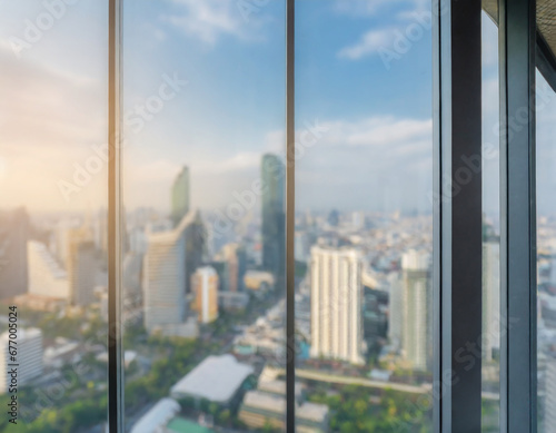 Blurred images of glass wall with city town background.modern abstract window for banner