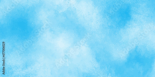 Defocused and blurry wet ink effect sky blue color watercolor background,Clouds on a blue background,beautiful and colorful watercolor used for wallpaper,banner, design,painting,arts,printing.