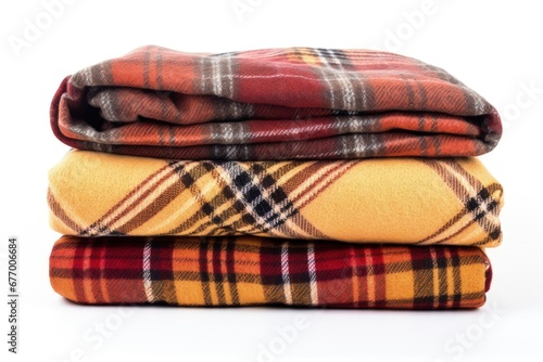 Cozy patterned blankets on a white background