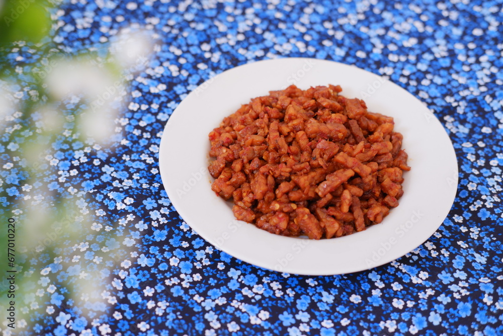 Orek tempe or Sauteed Tempeh is a typical Indonesian cuisine with herbs, garlic, onion, chilli and soy sauce. It tastes delicious Orek tempe or Sauteed Tempeh is a typical Indonesian cuisine with herbs, garlic, onion, chilli and soy sauce. It tastes delicious