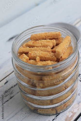 Indonesian cookies called kastangel  in a jar on the table  photo