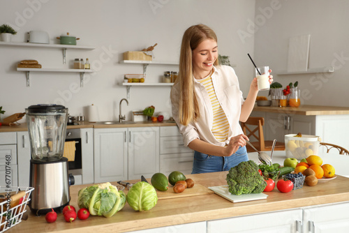 Young woman with vegetables...