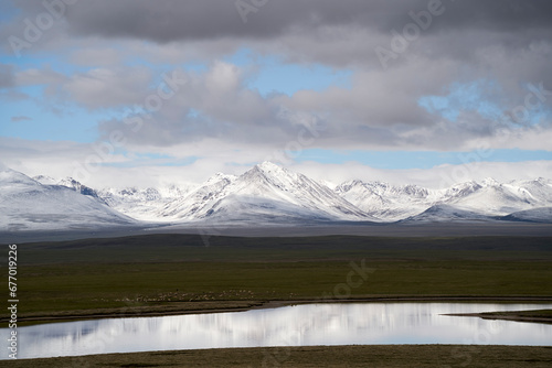 snow covered mountains and lake in Tibet, China