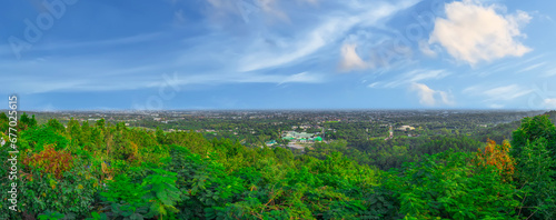 Panorama view of Chiangmai Chiang Mai city taken from Doi Suthep Mountains. Lovely views of the Old city at Sunset Sunrise lovely tropical mountains and beautiful nature in the foreground