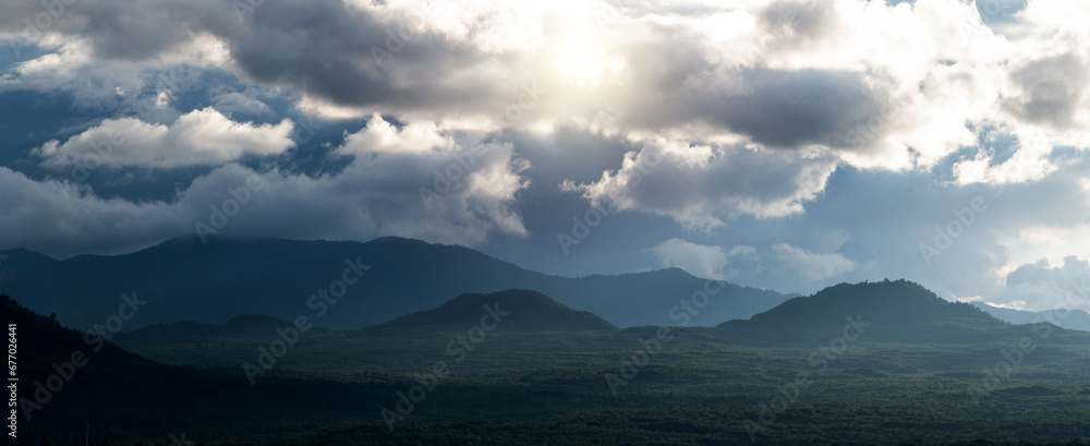 Landscape of mountain under cloudy sky
