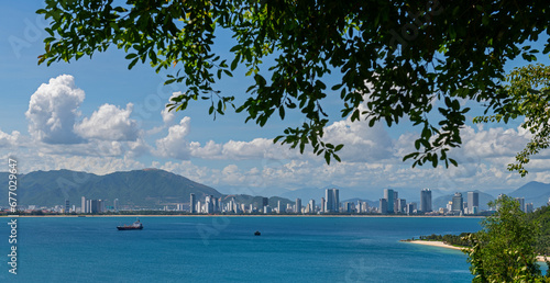 The sea bay and the Vietnamese city of Nha Trang on a sunny cloudy day